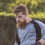 Dmytro Kontsevyi of Krakow Dragoons FC controlling the ball during a match