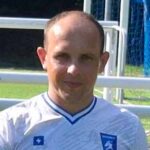 Serhii Yelysieiev of Krakow Dragoons FC posing for a profile picture giving the thumbs up