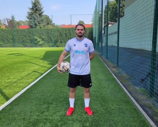 Obed Sánchez of Krakow Dragoons FC posing for a profile picture holding a football