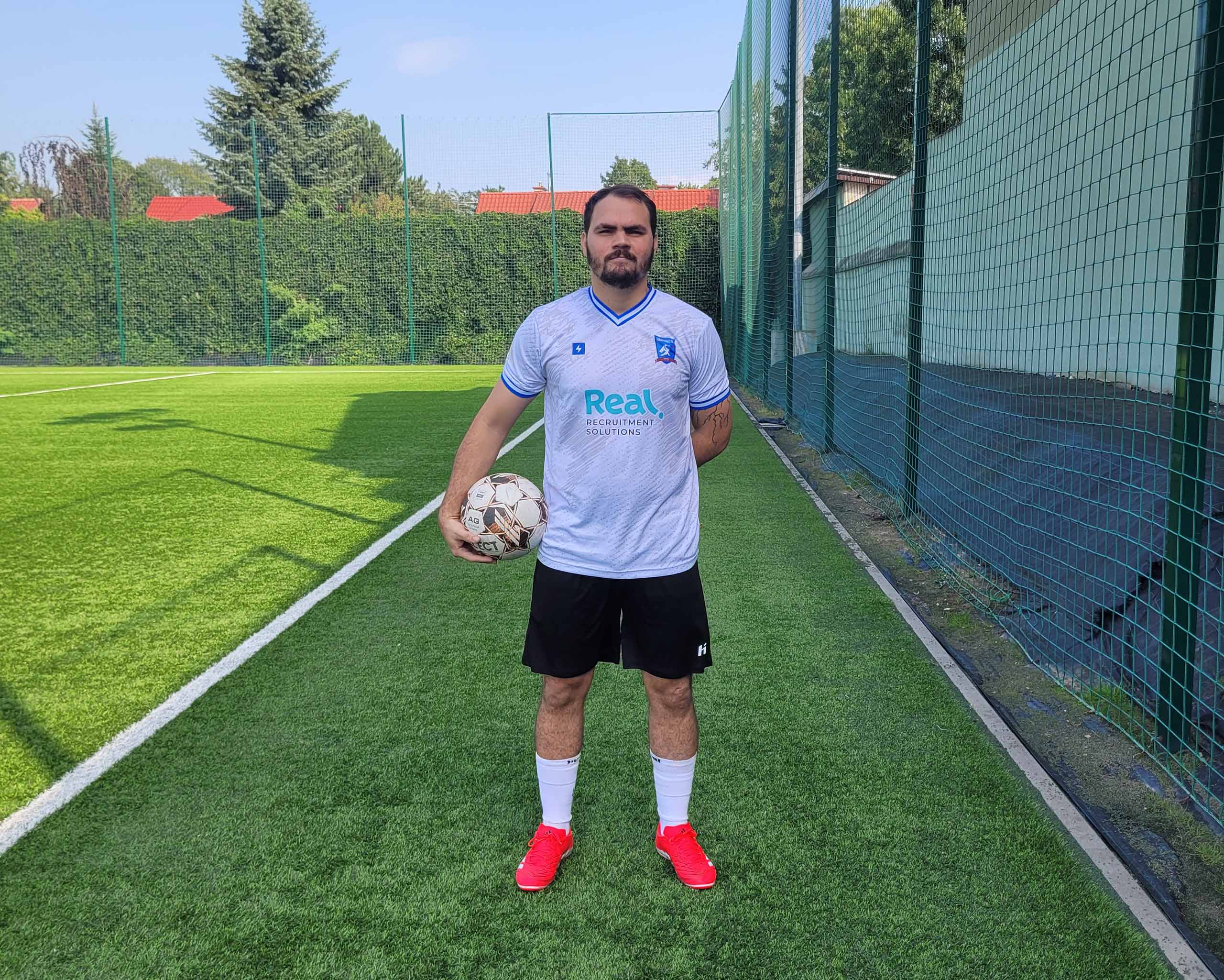 Obed Sánchez of Krakow Dragoons FC posing for a profile picture holding a football