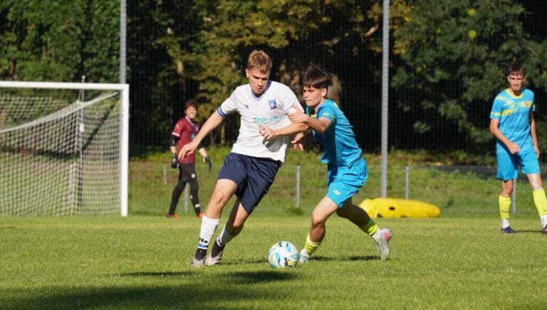 Roman Bilovol of Krakow Dragoons FC dribbling an opponent