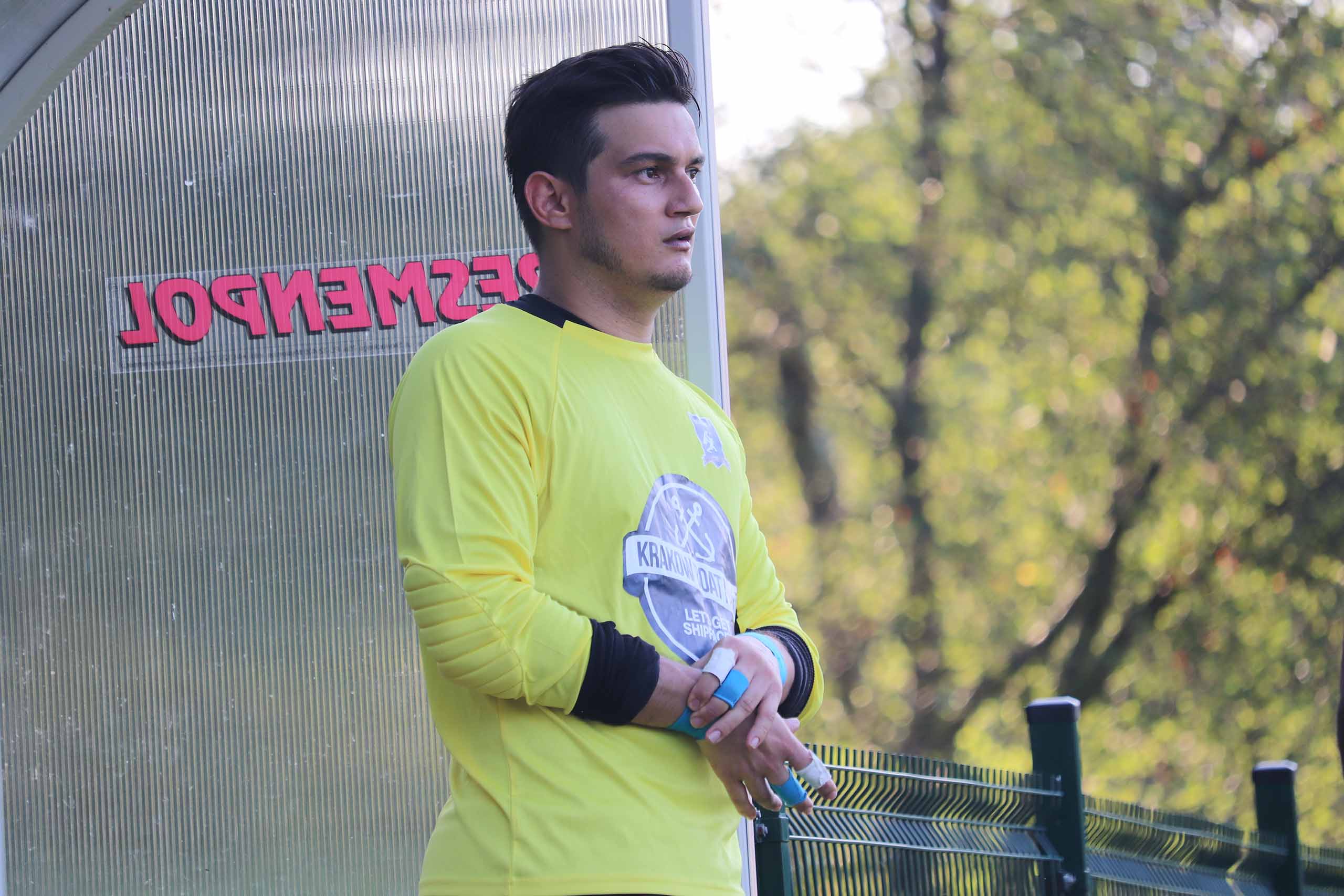 Paulo Fernandes of Krakow Dragoons FC watching a match by the sideline