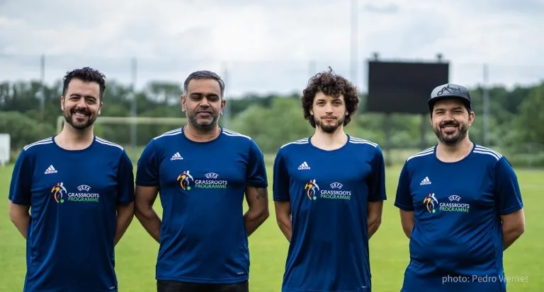 Krakow Dragoons FC staff wearing UEFA Grassroots Programme t-shirts