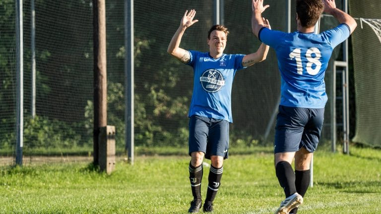 Enrico Forabosco and Joaquin Serrano of Krakow Dragoons FC celebrating a goal