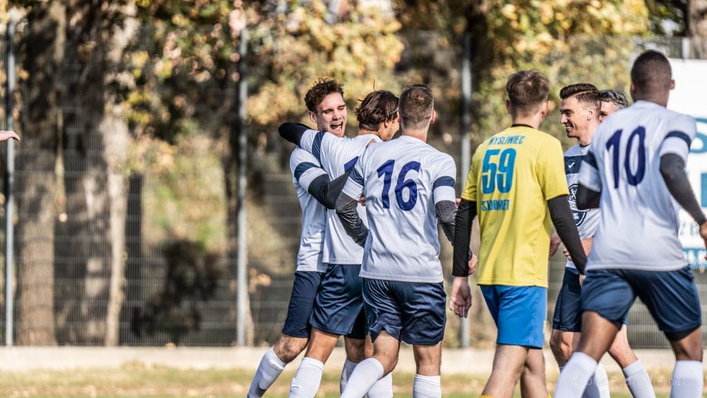 Krakow Dragoons FC celebrating a goal vs Albertus