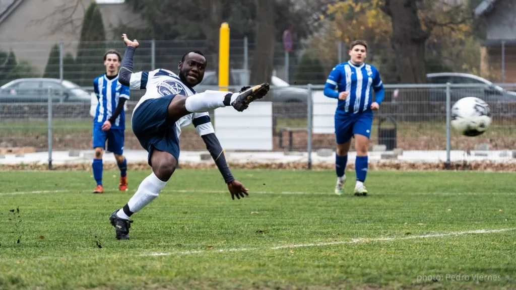 Cedrick Mwamba of Krakow Dragoons FC scoring an acrobatic goal