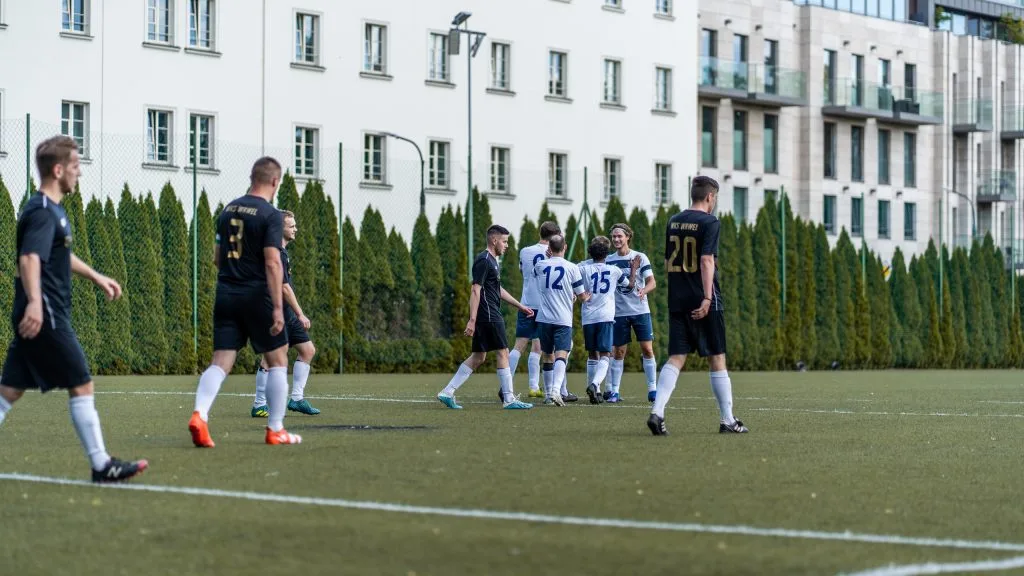 Krakow Dragoons FC celebrating a goal vs Wawel