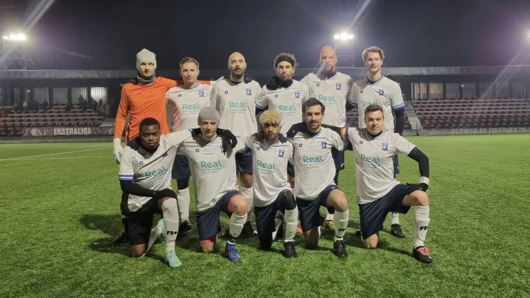 Krakow Dragoons FC starting 11 posing for a photo before the match vs Bieżanowianka