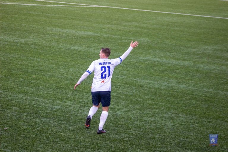 Robert Ambrosie of Krakow Dragoons FC asking for the ball in the free space