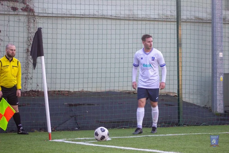 Robert Ambrosie of Krakow Dragoons FC preparing to take a corner kick