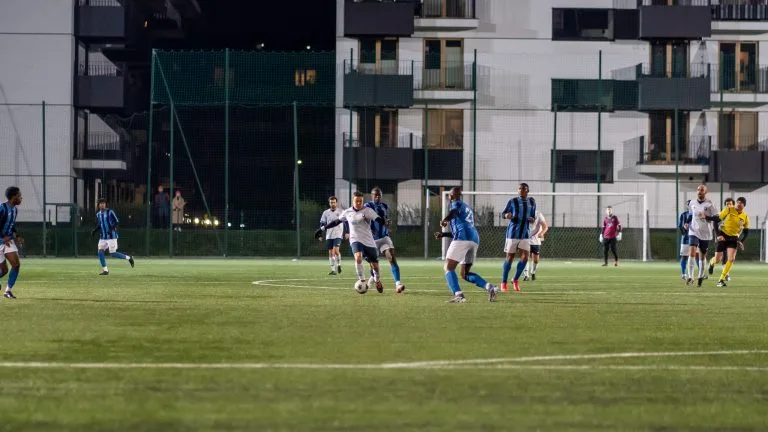 Enrico Forabosco of Krakow Dragoons FC running forward with the ball vs Afc DWS