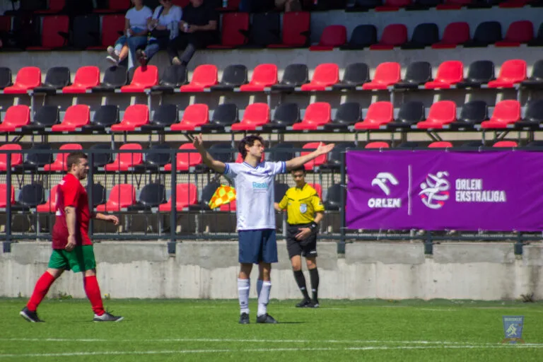 Hugo Cruz of Krakow Dragoons FC opening his arms wide in disappointment during a match vs LKS Krakus Swoszowice