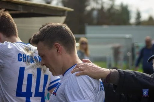 Enrico Forabosco of Krakow Dragoons FC being praised at the end of a match