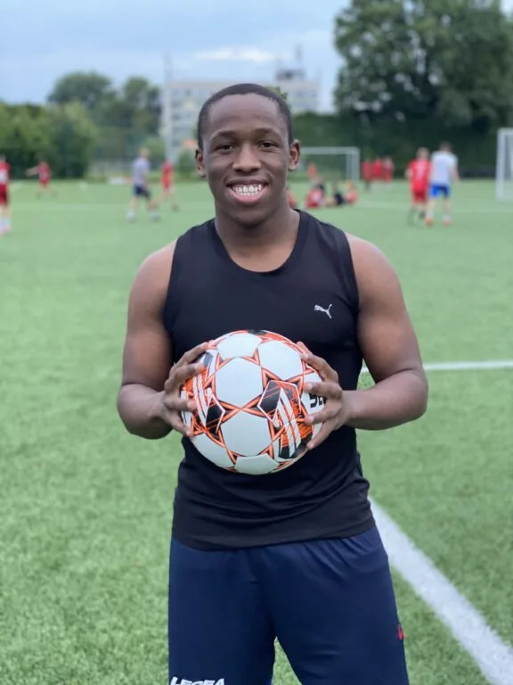 Keanu Solomons of Krakow Dragoons FC holding a ball