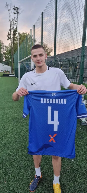 Oleksandr Arshakian of Krakow Dragoons FC showcasing his new Dragoons #4 jersey