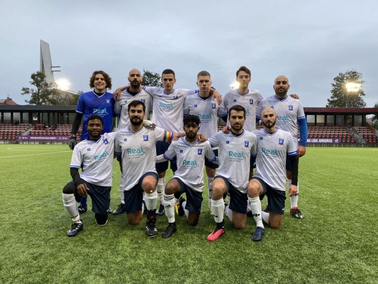 Krakow Dragoons FC starting 11 posing for a pre-match photo