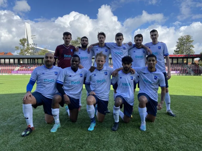 Krakow Dragoons FC starting 11 posing for a pre-match photo