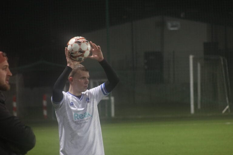 Roman Bilovol of Krakow Dragoons FC taking a throw in