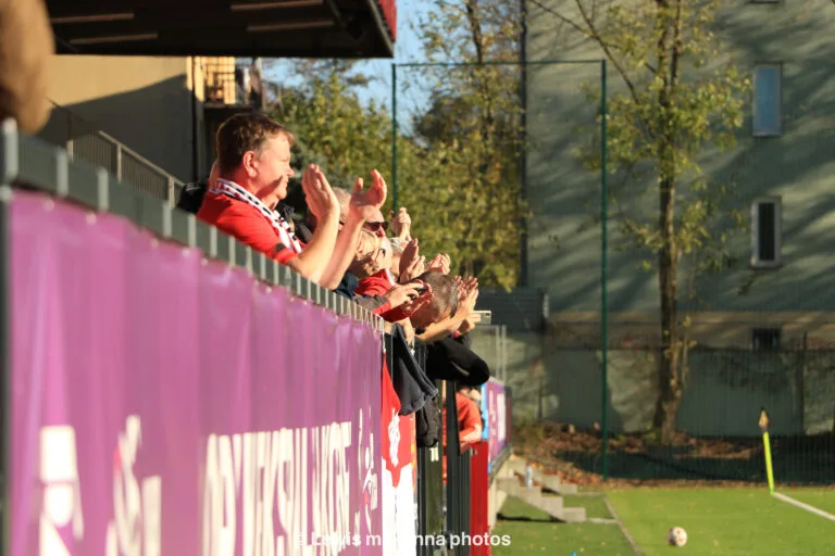 FC United of Manchester fans greeting the players