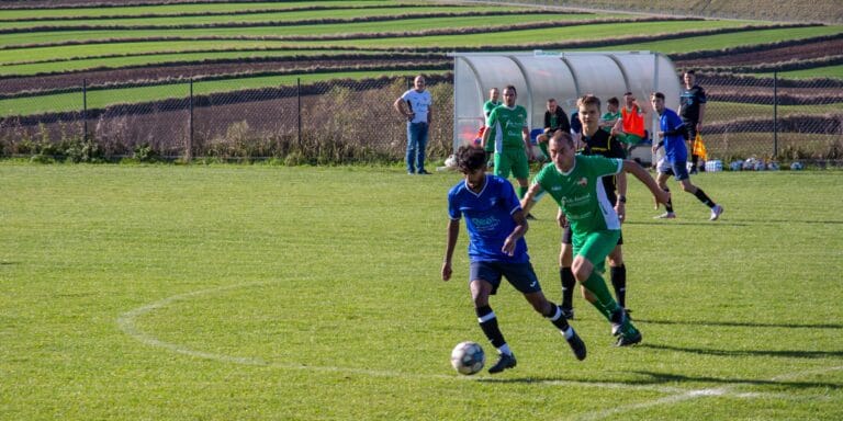 Rohit Chandran of Krakow Dragoons FC carrying the ball forward