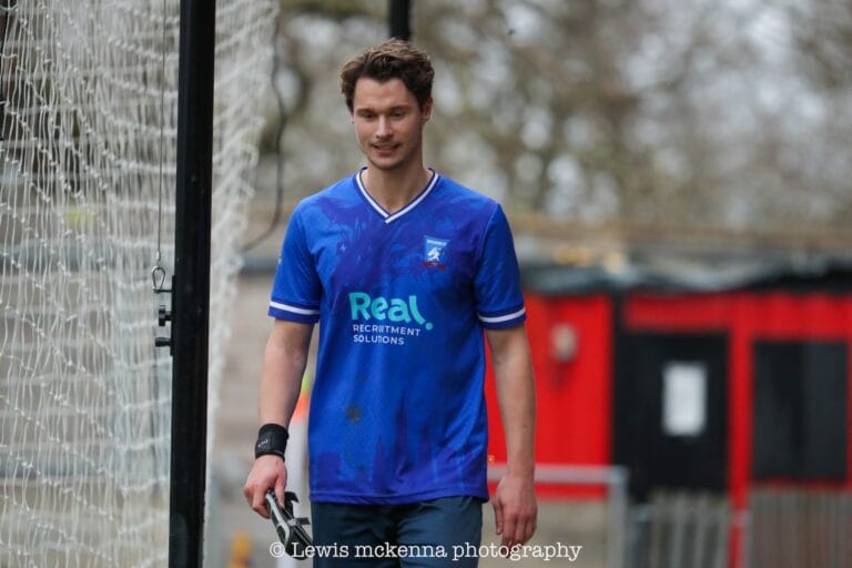 Josh Dawson of Krakow Dragoons FC leaving the pitch