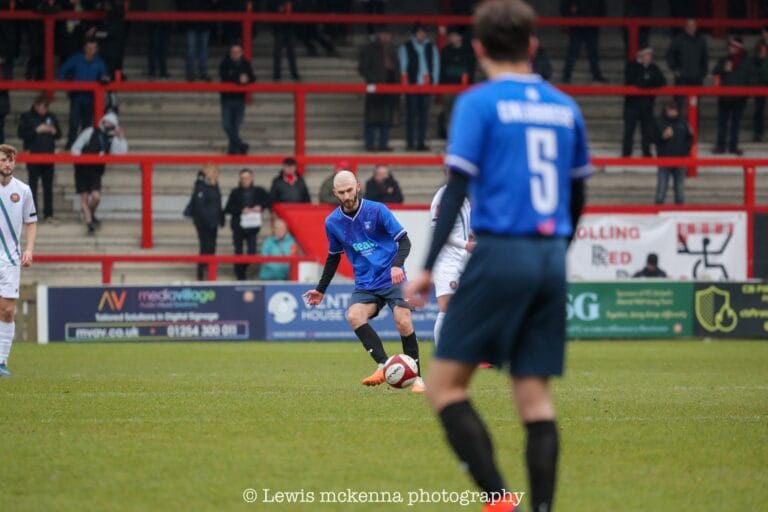 Yuri Samyonov of Krakow Dragoons FC starting the game from the kick off spot