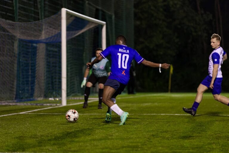 Flavio Nkola of Krakow Dragoons FC attempts a cross inside the area