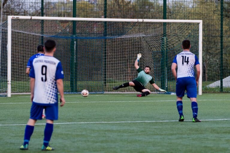 A penalty scored by Krakow Dragoons FC, with the ball going to the goalkeeper's opposite side