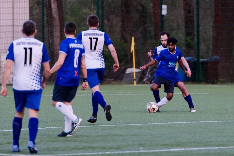 Rohit Chandran of Krakow Dragoons FC dribbling an opponent