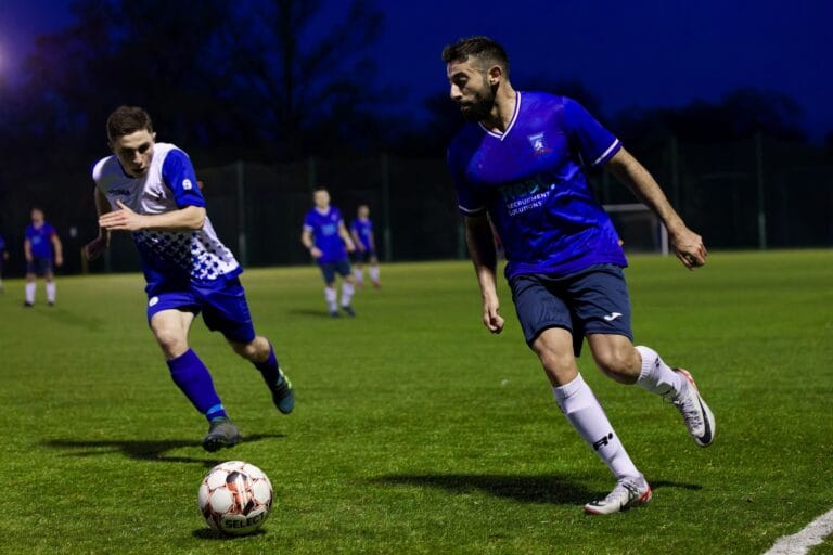 Francesco Leuci of Krakow Dragoons FC preparing for a cross with an opponent nearby