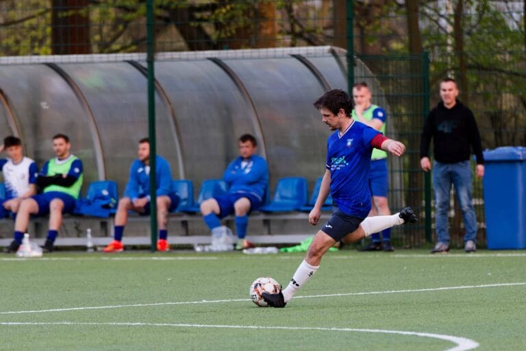 Mark Szczesnowicz of Krakow Dragoons FC shooting a ball