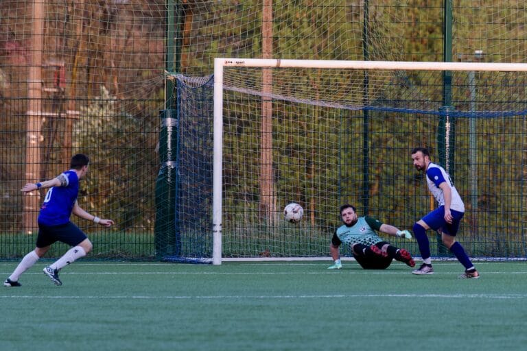 Enrico Forabosco of Krakow Dragoons FC attempts a shot at target