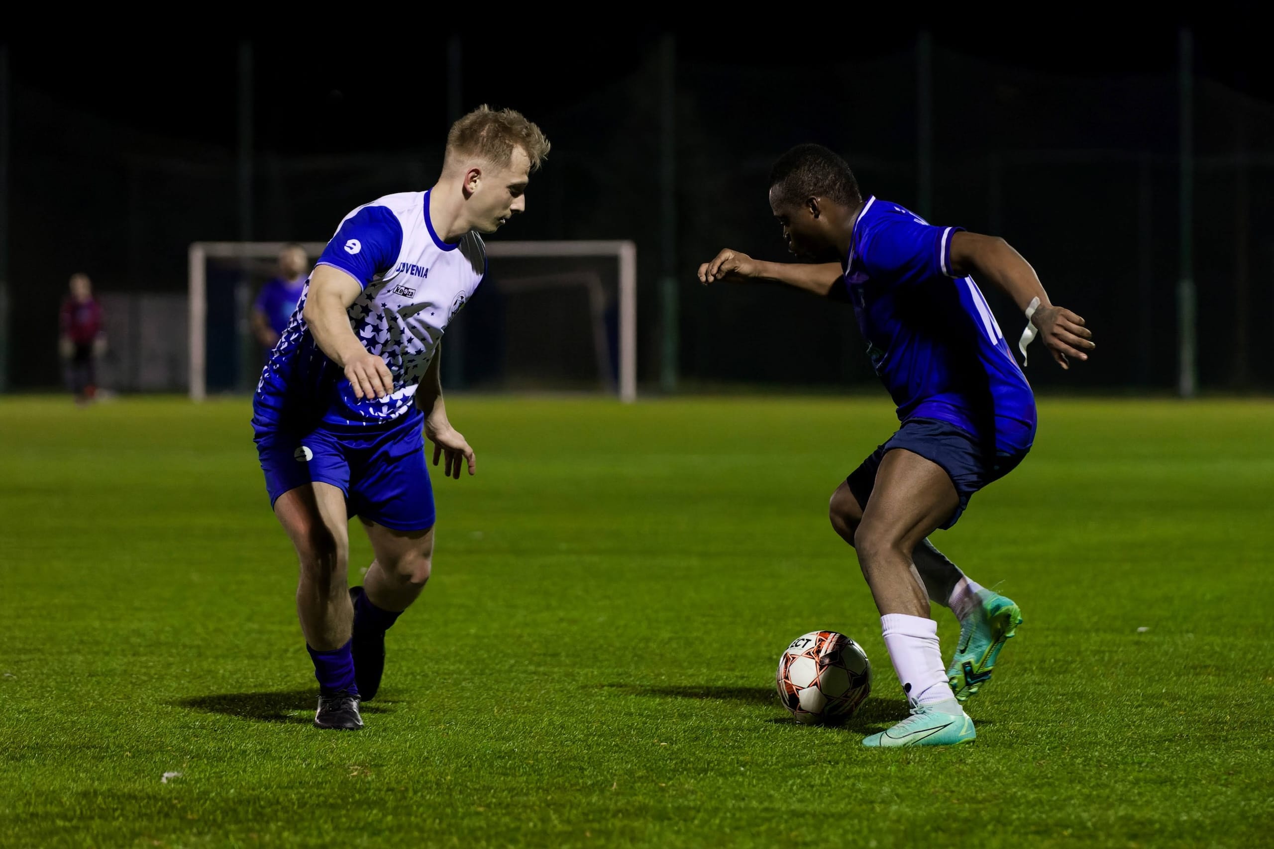 Flavio Nkola of Krakow Dragoons FC attempts dribbling an opponent