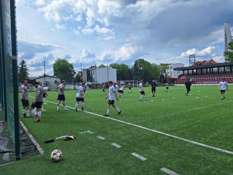 Krakow Dragoons FC players warming up before match