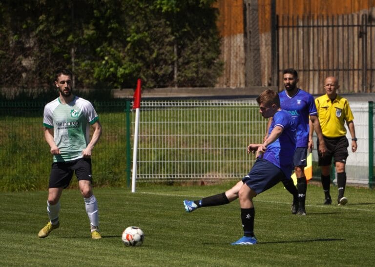 Roman Bilovol of Krakow Dragoons FC passing the ball