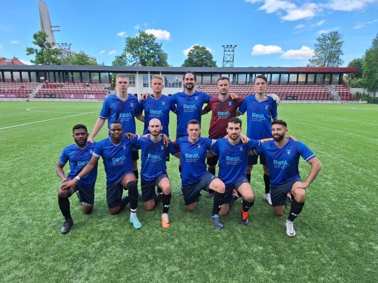 Krakow Dragoons FC players posing for a pre-match photo