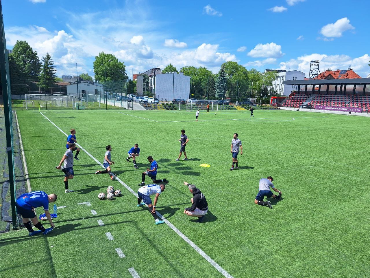 Krakow Dragoons FC players warming up