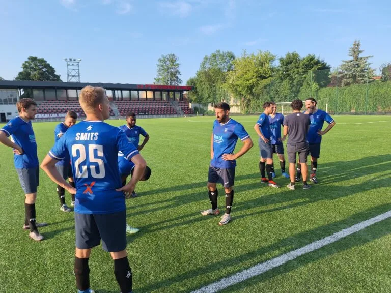 Krakow Dragoons FC players having the last talk before kickoff