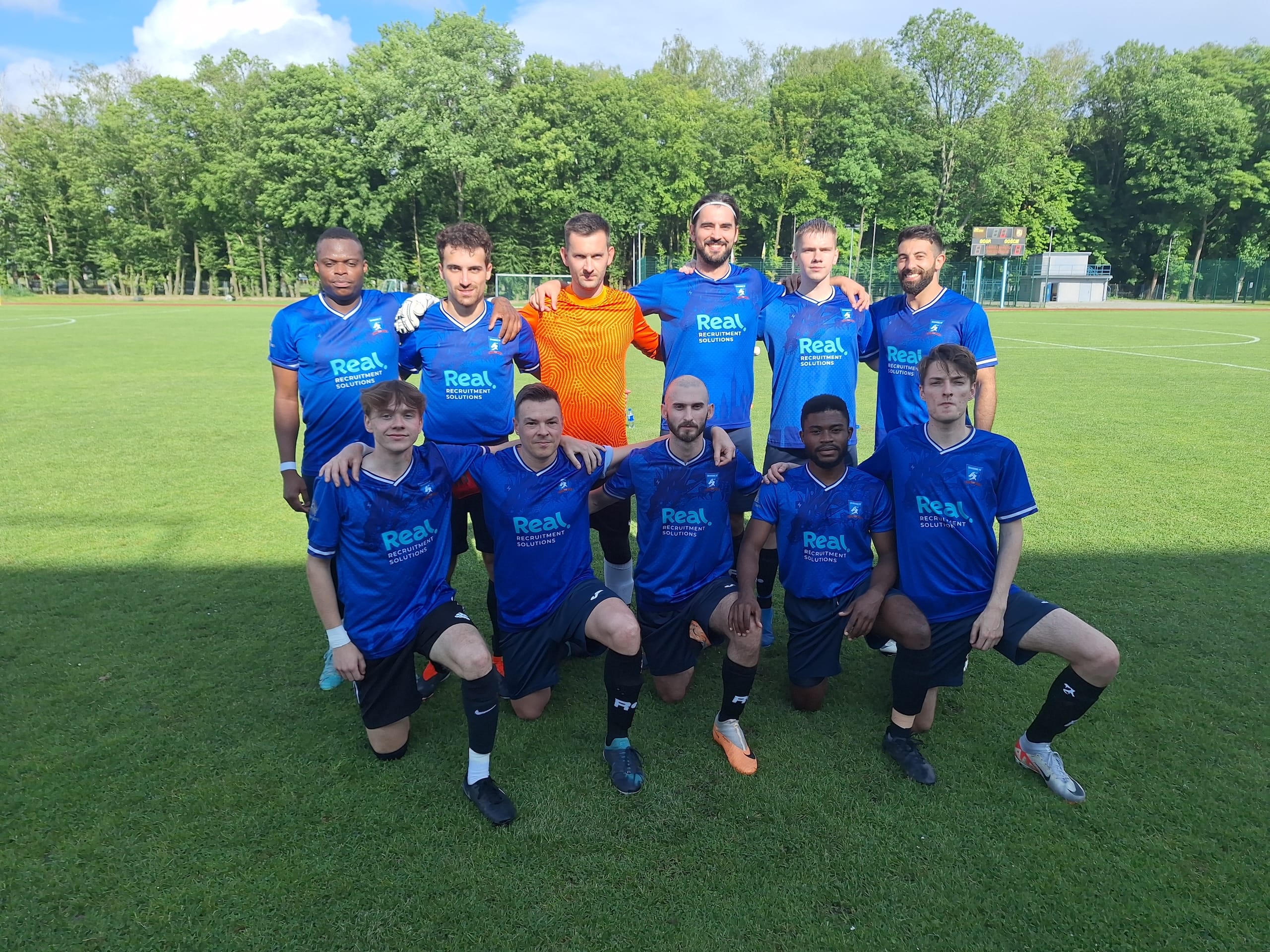 Krakow Dragoons FC players posing for a pre-match photo