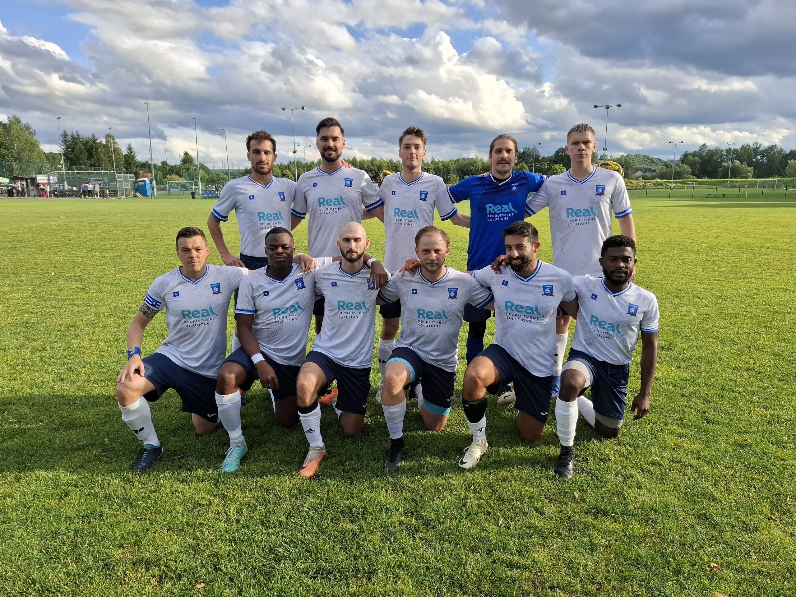 Krakow Dragoons FC players posing for a pre-match photo