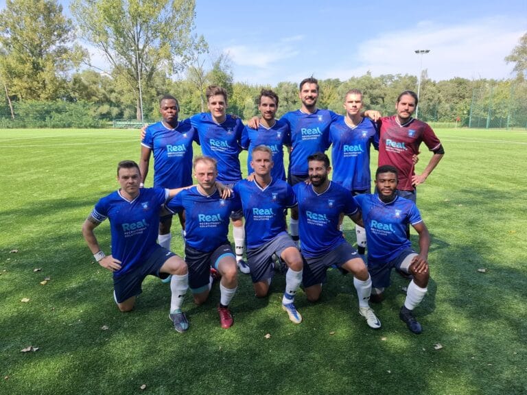 Krakow Dragoons FC players posing for a pre-match photo