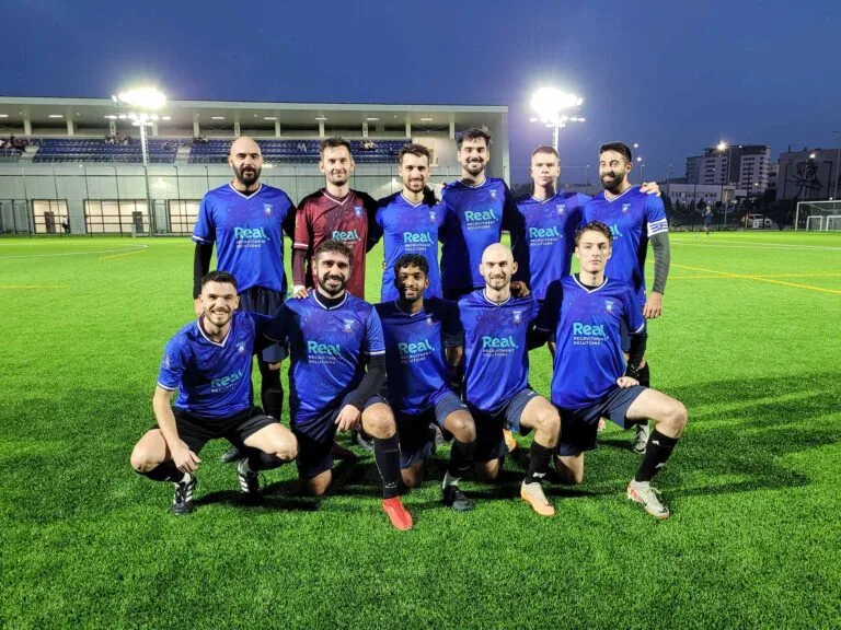 Krakow Dragoons FC players posing for a pre-match photo