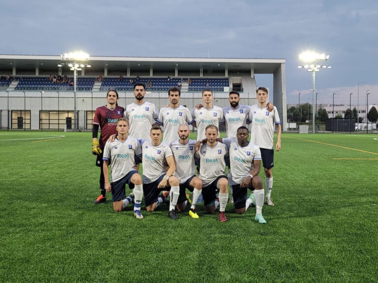 Krakow Dragoons FC players posing for a pre-match photo