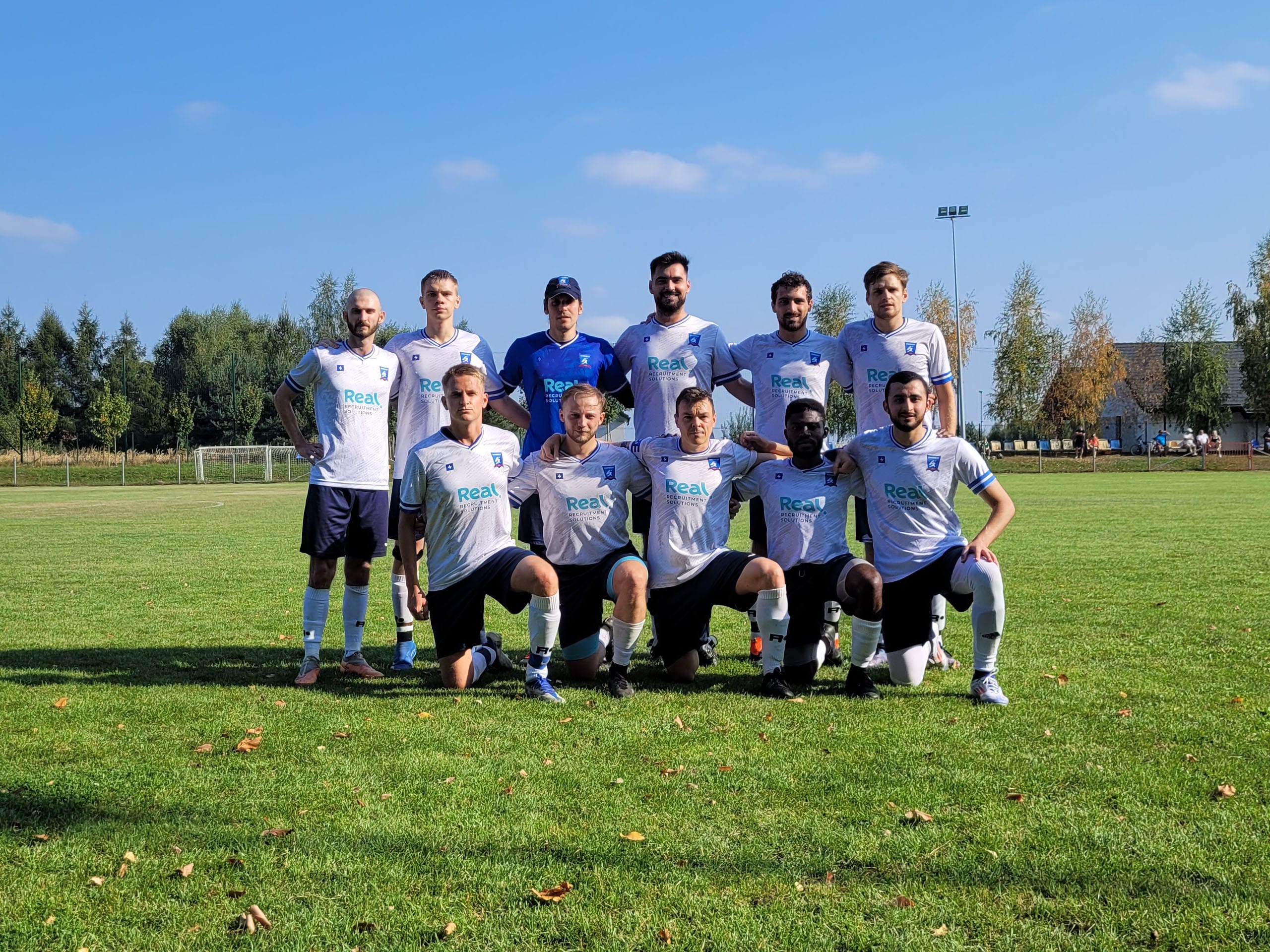 Krakow Dragoons FC players posing for a pre-match photo