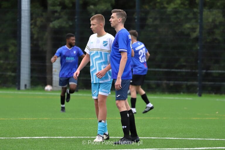 Brian Lemmen of Krakow Dragoons FC, marking a Błękitni II Modlnica player