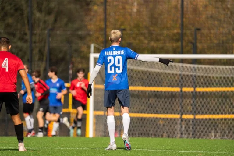 Vałdzis Fuhaš of Krakow Dragoons FC using his number 29 jersey with the words "Égaliberté" printed on the back