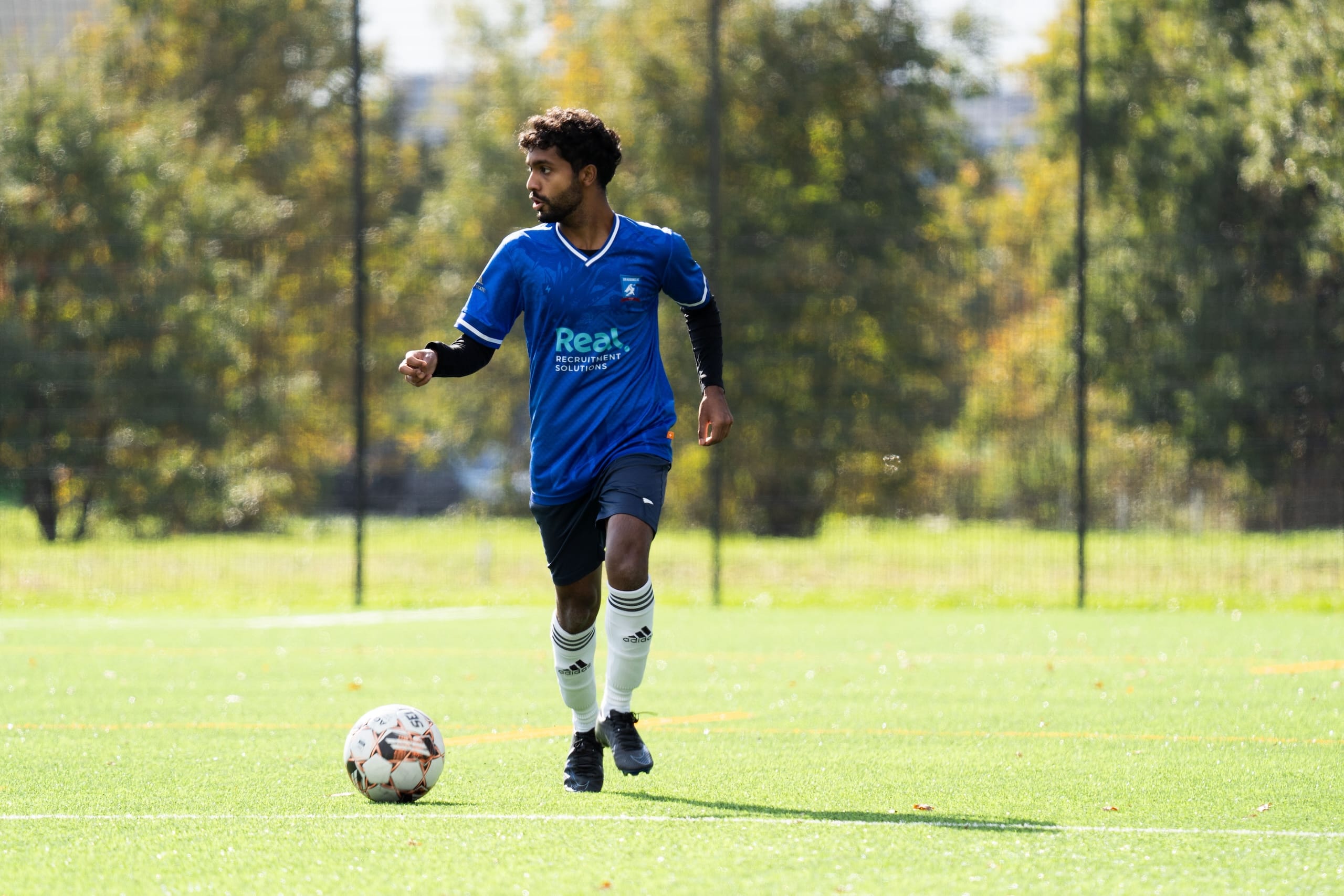 Rohit Chandran of Krakow Dragoons FC controlling the ball