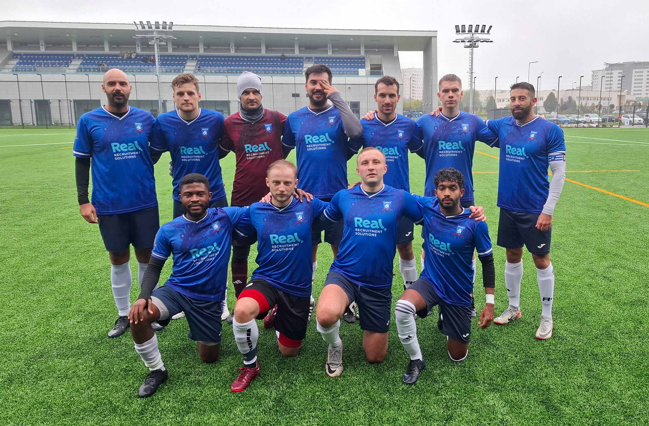 Krakow Dragoons FC players posing for a pre-match photo