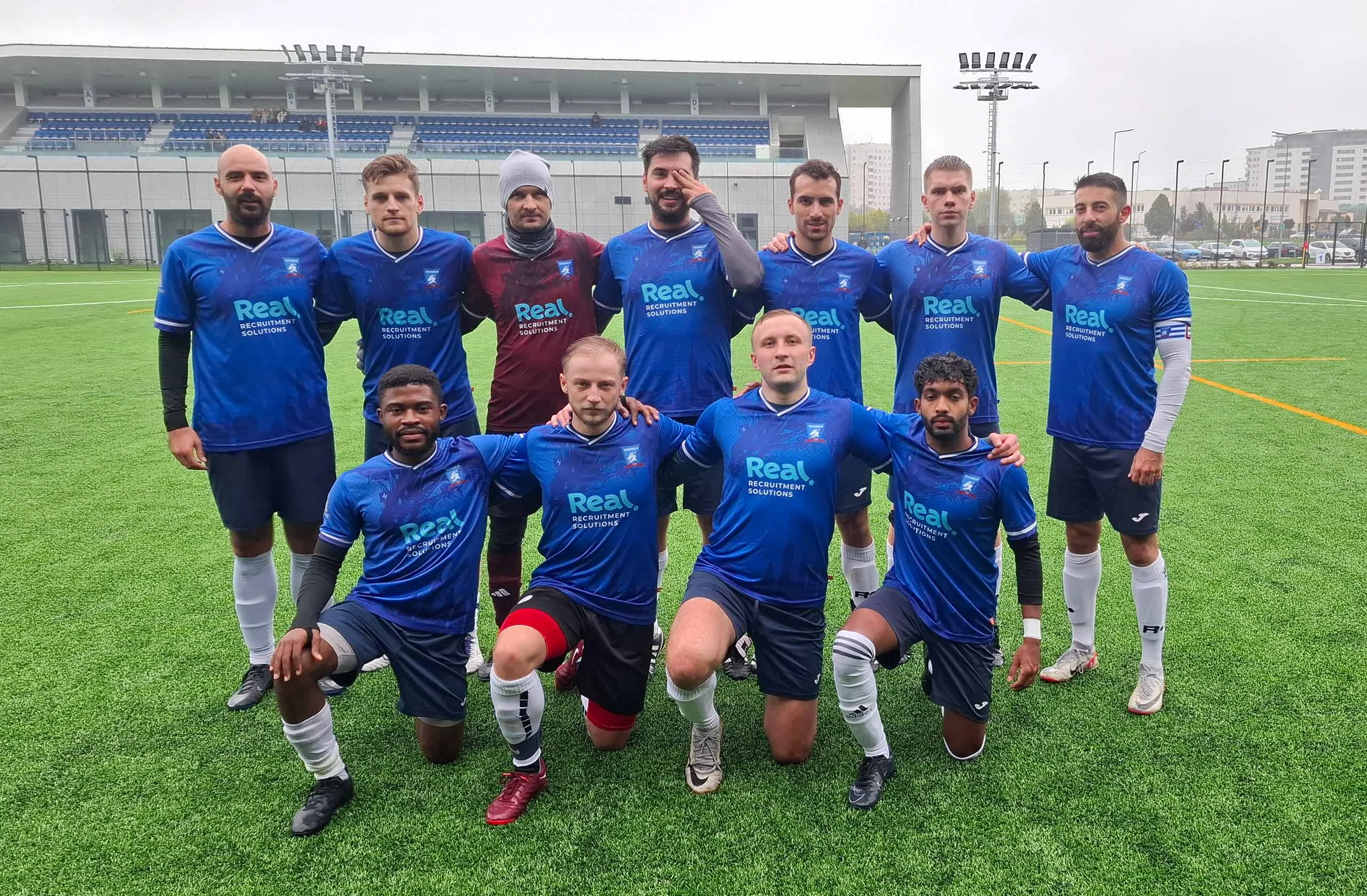 Krakow Dragoons FC players posing for a pre-match photo