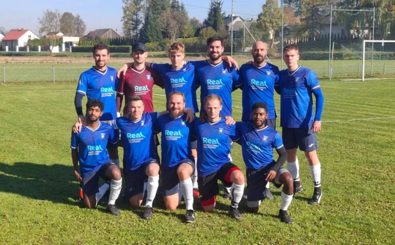 Krakow Dragoons FC players posing for a pre-match photo